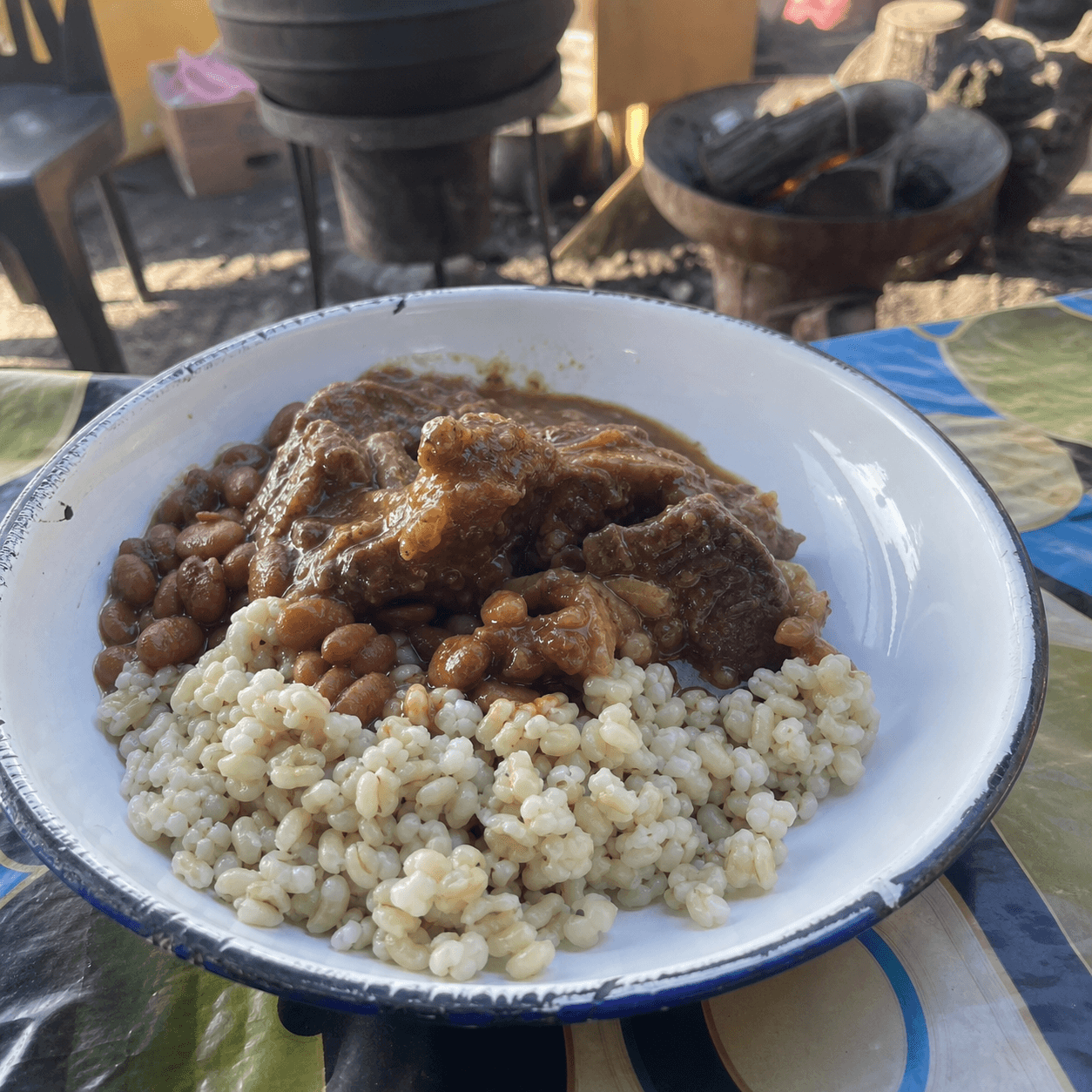 Umngqusho with lamb stew at a community food stall